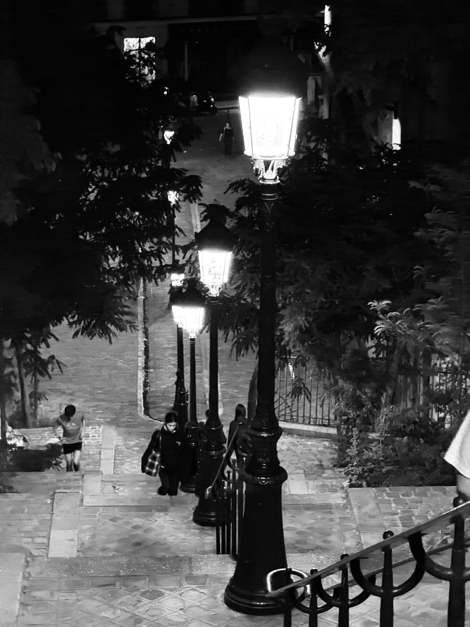 An original photograph of stone steps in Paris, illustrating structural progression and timeline pacing by magician and host Liam Ball.